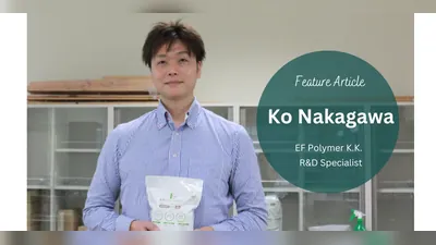 Ko Nakagawa, R&D specialist, holds a pack of EF Polymer