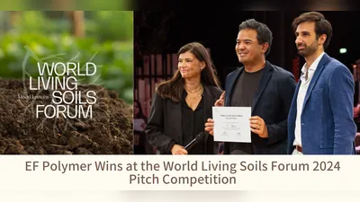 Narayan Gurjar receives the award on the World Living Soils Forum 2024 stage